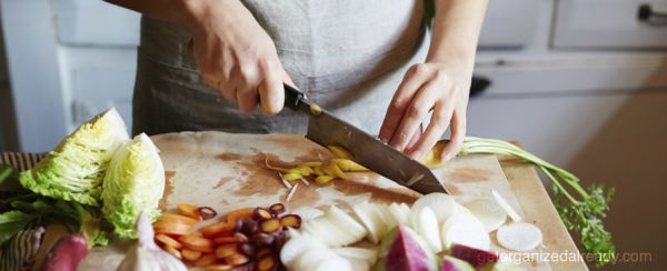 hands chopping vegetables