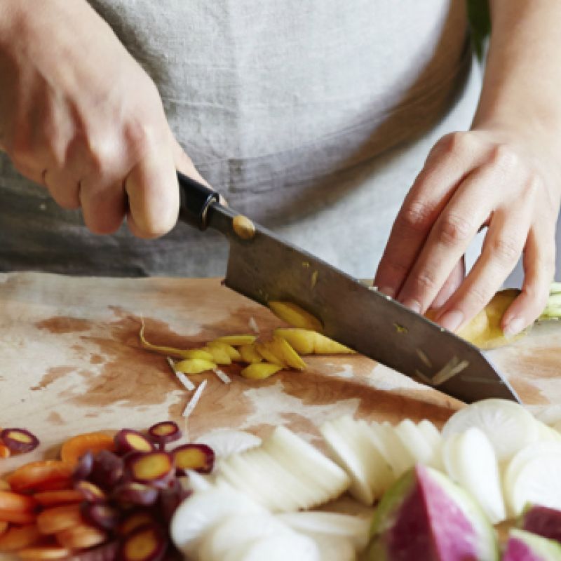 hands chopping vegetables