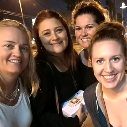 group of women smiling for a photo